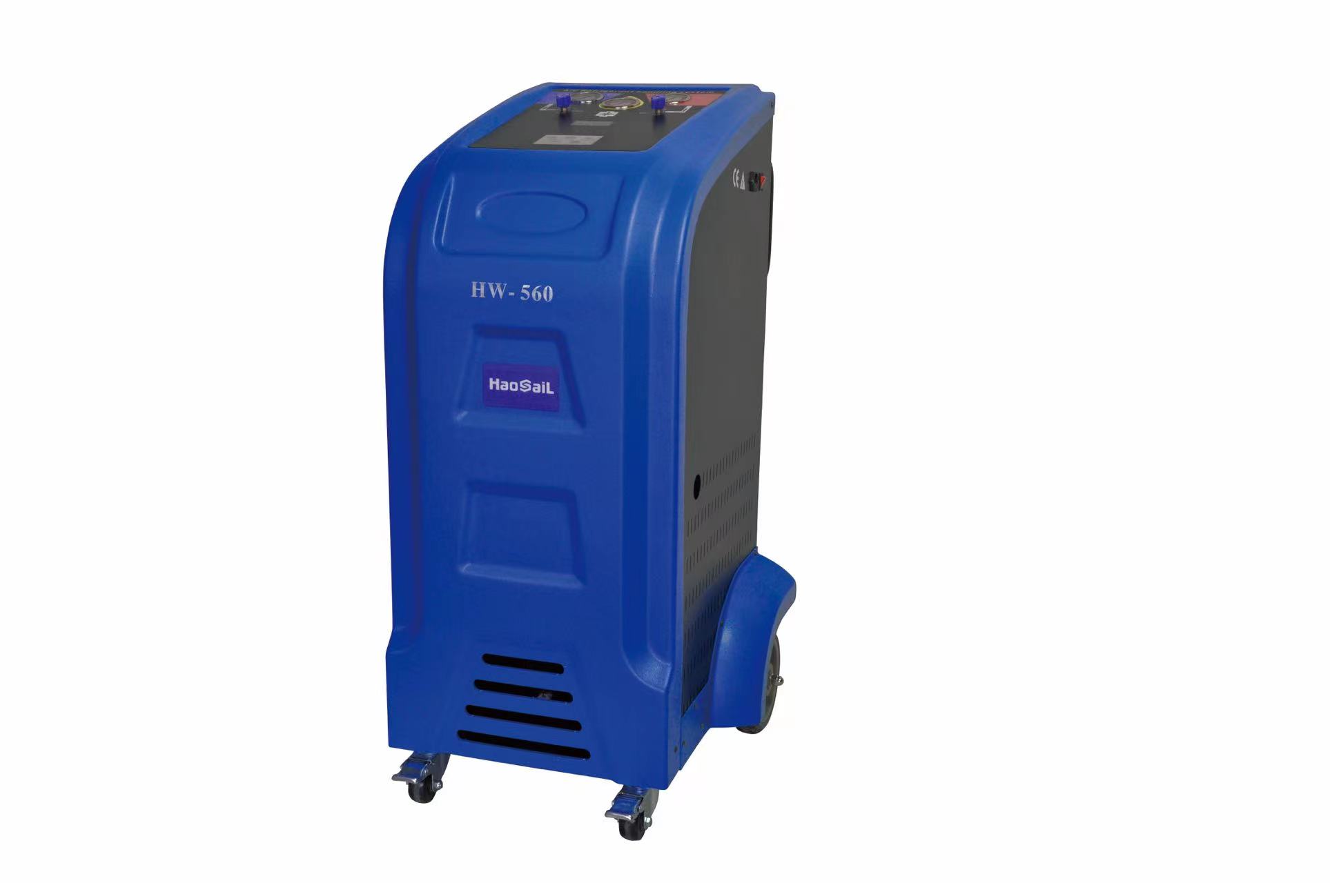 What is the function of a refrigerant recovery machine?